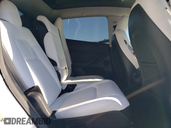 2024 Tesla Model Y Long Range with VIN 7SAYGAEE5RF064240, listed as a Copart auction lot 46349625 with 26,648 mi miles and Salvage title. Bid and sale history available at DreamBid. Image 10.