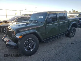 2021 Jeep Gladiator Rubicon с VIN 1C6JJTBM1ML599103, выставлен на аукционе Copart как лот 77084134 с пробегом 16 031 миль миль и Списание • Salvage title. История ставок и продаж доступна на DreamBid. Изображение 1.