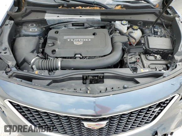 2020 Cadillac XT4 FWD Sport z VIN 1GYFZER49LF054184, wystawiony jako Copart lot #50274585 z przebiegiem 28 341 mil mil oraz Szkoda całkowita • Salvage title. Historia ofert i sprzedaży dostępna na DreamBid. Obrazek 14.