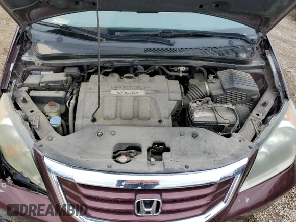 2010 Honda Odyssey Touring with VIN 5FNRL3H94AB056657, listed as a Copart auction lot 72658934 with 202,690 mi miles and Salvage title. Bid and sale history available at DreamBid. Image 12.
