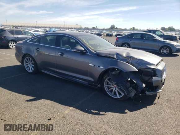 2017 Jaguar XJ with VIN SAJWA1C73H8W11256, listed as a Copart auction lot 49153633 with 12,199 mi miles. Bid and sale history available at carsss.com. Image 4.