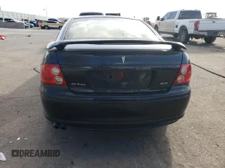 2004 Pontiac GTO with VIN 6G2VX12G24L261448, listed as a Copart auction lot 44951945 with 43,257 mi miles and Salvage Title. Bid and sale history available at carsss.com. Image 6.