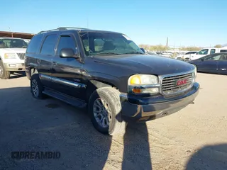 2003 GMC Yukon SLT with VIN 1GKEK13Z93J137232, listed as a IAAI auction lot 41349300 with 221,291 mi miles. Bid and sale history available at carsss.com. Image 1.