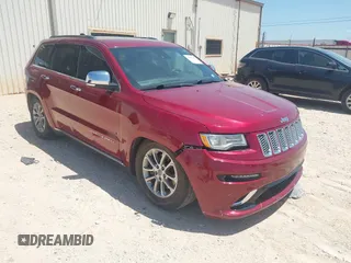 2014 Jeep Grand Cherokee Summit with VIN 1C4RJFJT1EC237358, listed as a IAAI auction lot 42602245 with 106,821 mi miles and . Bid and sale history available at DreamBid. Image 1.