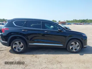 2021 Hyundai Santa Fe SEL z VIN 5NMS64AJ3MH331523, wystawiony jako IAAI lot #42201780 z przebiegiem 84 319 mil mil oraz . Historia ofert i sprzedaży dostępna na DreamBid. Obrazek 14.