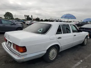 1989 Mercedes-Benz 560 with VIN WDBCA39E2KA479060, listed as a Copart auction lot 81924154 with 172,377 mi miles and Salvage Title. Bid and sale history available at DreamBid. Image 3.