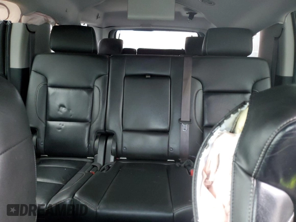 2015 Chevrolet Suburban LT with VIN 1GNSCJKC2FR306223, listed as a Copart auction lot 58733475 with 191,330 mi miles and Salvage title. Bid and sale history available at DreamBid. Image 10.