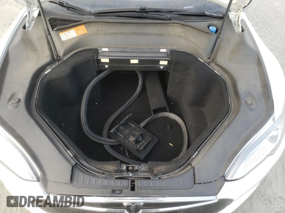 2014 Tesla Model S 60 с VIN 5YJSA1H18EFP33284, выставлен на аукционе Copart как лот 57434905 с пробегом 156 750 миль миль и Списание • Salvage title. История ставок и продаж доступна на DreamBid. Изображение 11.