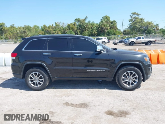 2015 Jeep Grand Cherokee Limited with VIN 1C4RJFBG8FC790575, listed as a IAAI auction lot 42124709 with 248,827 mi miles. Bid and sale history available at carsss.com. Image 13.