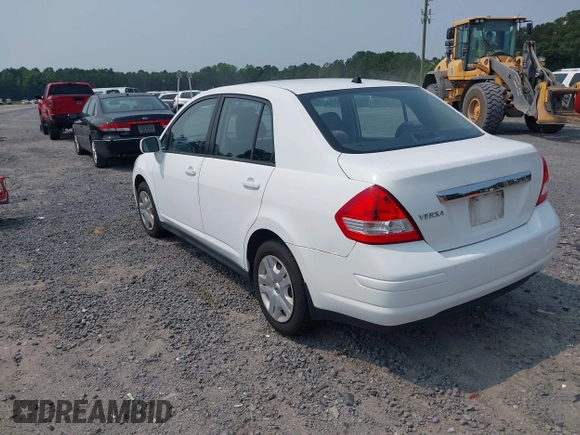 2010 Nissan Versa S with VIN 3N1BC1AP8AL415222, listed as a IAAI auction lot 42400894 with 124,129 mi miles and . Bid and sale history available at DreamBid. Image 3.