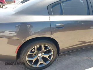 2015 Dodge Charger SXT with VIN 2C3CDXHG4FH890684, listed as a IAAI auction lot 41896958 with 118,140 mi miles and . Bid and sale history available at DreamBid. Image 6.