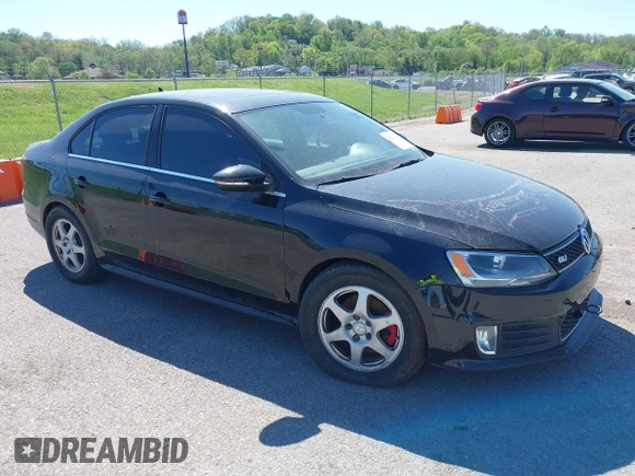 2014 Volkswagen Jetta GLI with VIN 3VW4T7AJ5EM382195, listed as a IAAI auction lot 39211126 with 94,735 mi miles and . Bid and sale history available at DreamBid. Image 1.