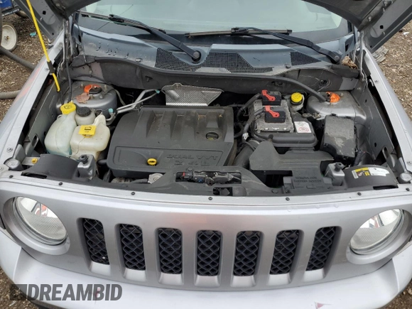 2015 Jeep Patriot High Altitude with VIN 1C4NJRFB2FD396806, listed as a Copart auction lot 57651155 with 130,357 mi miles and Salvage title. Bid and sale history available at DreamBid. Image 12.