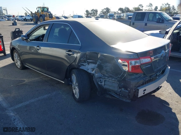 2014 Toyota Camry Hybrid LE with VIN 4T1BD1FK5EU106743, listed as a IAAI auction lot 41323019 with 84,511 mi miles. Bid and sale history available at carsss.com. Image 3.