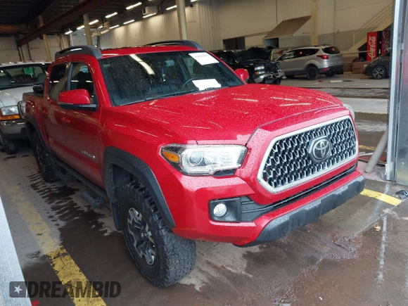 2019 Toyota Tacoma SR z VIN 3TMCZ5AN5KM220079, wystawiony jako IAAI lot #41856695 z przebiegiem 51 918 mil mil oraz . Historia ofert i sprzedaży dostępna na DreamBid. Obrazek 1.
