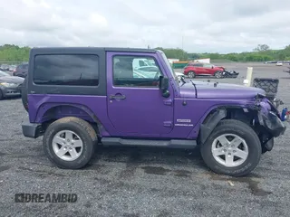 2017 Jeep Wrangler Sport z VIN 1C4AJWAG1HL633794, wystawiony jako IAAI lot #42189035 z przebiegiem 90 139 mil mil oraz . Historia ofert i sprzedaży dostępna na DreamBid. Obrazek 13.