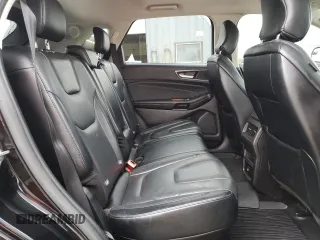 2017 Ford Edge Titanium z VIN 2FMPK3K95HBB20324, wystawiony jako Copart lot #43431055 z przebiegiem 108 006 mil mil oraz Szkoda całkowita • Salvage title. Historia ofert i sprzedaży dostępna na DreamBid. Obrazek 11.