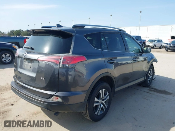2017 Toyota RAV4 LE with VIN JTMZFREV4HJ113745, listed as a IAAI auction lot 41582326 with 186,394 mi miles and . Bid and sale history available at DreamBid. Image 4.