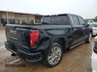2020 GMC Sierra 1500 Denali with VIN 1GTU9FEL1LZ160062, listed as a Copart auction lot 59551395 with 106,223 mi miles and Salvage title. Bid and sale history available at DreamBid. Image 3.