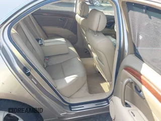 2006 Acura RL z VIN JH4KB16596C005876, wystawiony jako IAAI lot #42666228 z przebiegiem 146 897 mil mil oraz . Historia ofert i sprzedaży dostępna na DreamBid. Obrazek 8.