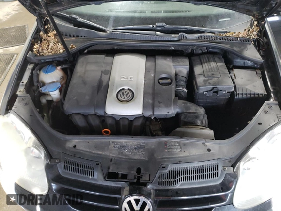 2009 Volkswagen Rabbit S with VIN WVWAA71K69W001495, listed as a Copart auction lot 86813914 with 147,398 mi miles and Salvage title. Bid and sale history available at DreamBid. Image 11.