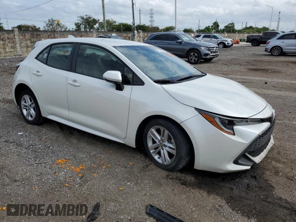 2020 Toyota Corolla Hatchback SE with VIN JTND4RBE2L3088079, listed as a Copart auction lot 75100054 with 27,730 mi miles and Salvage Title. Bid and sale history available at carsss.com. Image 4.