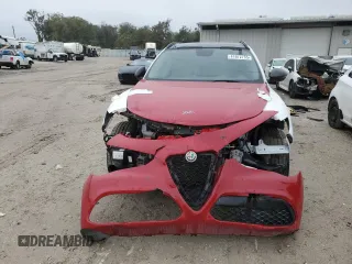 2020 Alfa Romeo Stelvio z VIN ZASPAJAN1L7C92420, wystawiony jako Copart lot #41972755 z przebiegiem Nie podano mil oraz Nie do naprawy. Historia ofert i sprzedaży dostępna na DreamBid. Obrazek 5.