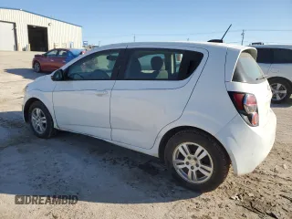 2015 Chevrolet Sonic LS with VIN 1G1JA6SH3F4141324, listed as a Copart auction lot 46271675 with 149,245 mi miles and Salvage title. Bid and sale history available at DreamBid. Image 2.
