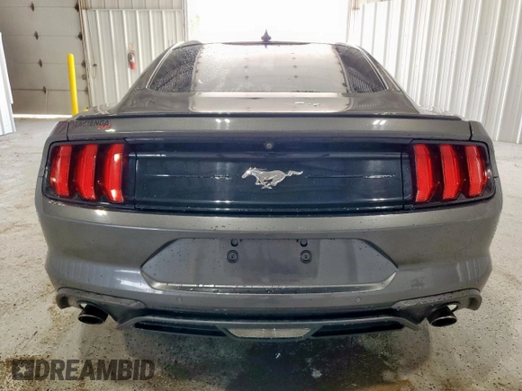 2020 Ford Mustang EcoBoost z VIN 1FA6P8TH7L5159827, wystawiony jako Copart lot #61649665 z przebiegiem 59 453 mil mil oraz Czysty tytuł • Clean title. Historia ofert i sprzedaży dostępna na DreamBid. Obrazek 6.