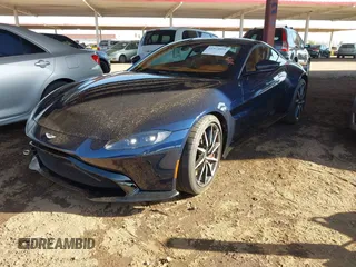 2019 Aston Martin Vantage z VIN SCFSMGAW3KGN00836, wystawiony jako IAAI lot #41974894 z przebiegiem 16 835 mil mil oraz . Historia ofert i sprzedaży dostępna na DreamBid. Obrazek 2.