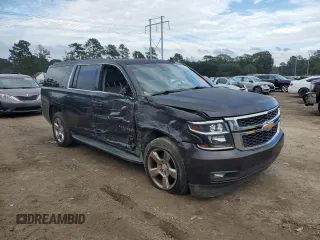 2016 Chevrolet Suburban LT with VIN 1GNSCHKCXGR464772, listed as a Copart auction lot 80065134 with 79,706 mi miles and Salvage Title. Bid and sale history available at carsss.com. Image 4.