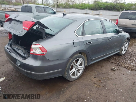 2014 Volkswagen Passat SE с VIN 1VWBN7A39EC085032, выставлен на аукционе IAAI как лот 41931302 с пробегом 193 425 миль миль и . История ставок и продаж доступна на DreamBid. Изображение 4.