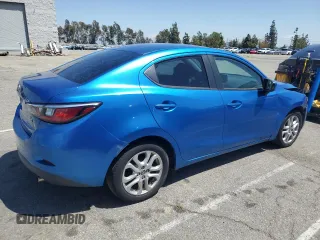 2016 Scion iA z VIN 3MYDLBZV6GY141028, wystawiony jako Copart lot #55264655 z przebiegiem 110 327 mil mil oraz Czysty tytuł • Clean title. Historia ofert i sprzedaży dostępna na DreamBid. Obrazek 3.