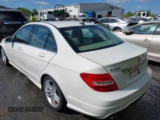 2012 Mercedes-Benz C with VIN WDDGF8BB9CR230328, listed as a IAAI auction lot 42024792 with 129,739 mi miles. Bid and sale history available at carsss.com. Image 3.