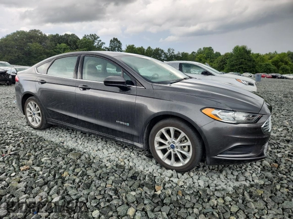 2017 Ford Fusion Hybrid SE with VIN 3FA6P0LU1HR269808, listed as a Copart auction lot 65921915 with 201,903 mi miles and Clean title. Bid and sale history available at DreamBid. Image 4.