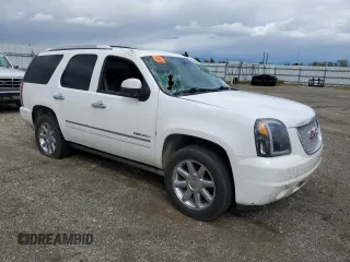 2014 GMC Yukon Denali with VIN 1GKS2EEF1ER212412, listed as a Copart auction lot 50954565 with 115,964 mi miles and Salvage Title. Bid and sale history available at carsss.com. Image 4.