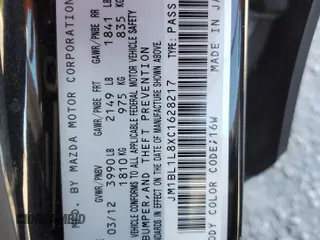2012 Mazda 3 i Touring with VIN JM1BL1L8XC1628217, listed as a Copart auction lot 58494425 with 62,727 mi miles and Salvage title. Bid and sale history available at DreamBid. Image 14.