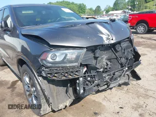 2019 Dodge Durango R/T with VIN 1C4SDJCTXKC740858, listed as a IAAI auction lot 42380318 with 99,060 mi miles and . Bid and sale history available at DreamBid. Image 18.