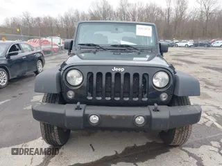 2014 Jeep Wrangler Sport with VIN 1C4AJWAG9EL312856, listed as a IAAI auction lot 42022870 with 98,323 mi miles and . Bid and sale history available at DreamBid. Image 12.