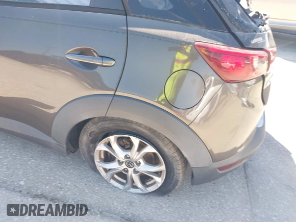 2016 Mazda CX-3 Touring with VIN JM1DKBC7XG0114940, listed as a IAAI auction lot 41777630 with 71,275 mi miles and . Bid and sale history available at DreamBid. Image 20.