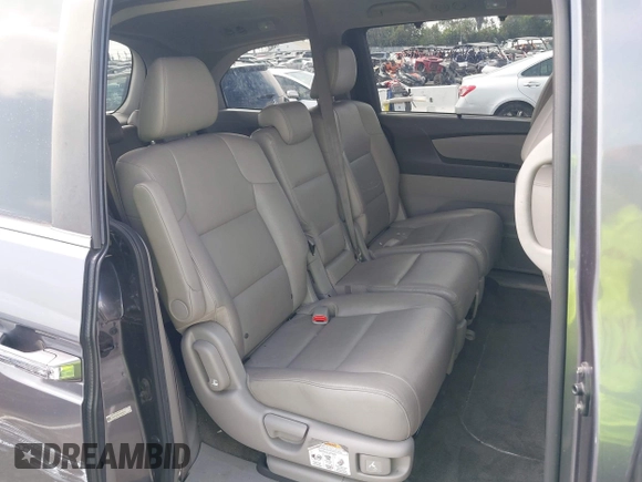 2014 Honda Odyssey EX-L with VIN 5FNRL5H64EB026520, listed as a IAAI auction lot 42562290 with 118,890 mi miles and . Bid and sale history available at DreamBid. Image 8.