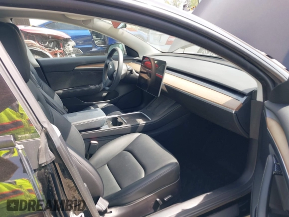 2022 Tesla Model 3 Long Range with VIN 5YJ3E1EB7NF241996, listed as a IAAI auction lot 42115915 with 23,433 mi miles and . Bid and sale history available at DreamBid. Image 5.