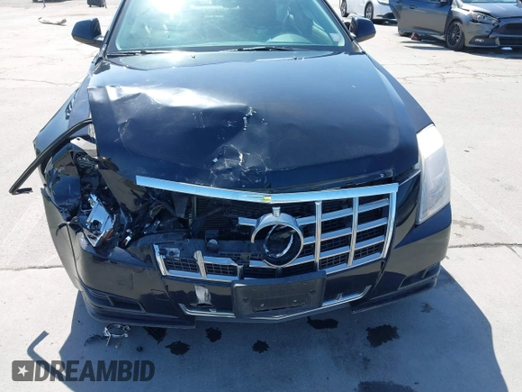 2013 Cadillac CTS Luxury z VIN 1G6DE5E55D0118056, wystawiony jako IAAI lot #42085384 z przebiegiem Nie podano mil oraz . Historia ofert i sprzedaży dostępna na DreamBid. Obrazek 6.
