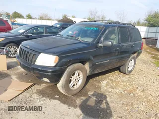 1999 Jeep Grand Cherokee Limited with VIN 1J4GW68S8XC588500, listed as a IAAI auction lot 41484787 with 161,961 mi miles. Bid and sale history available at carsss.com. Image 2.