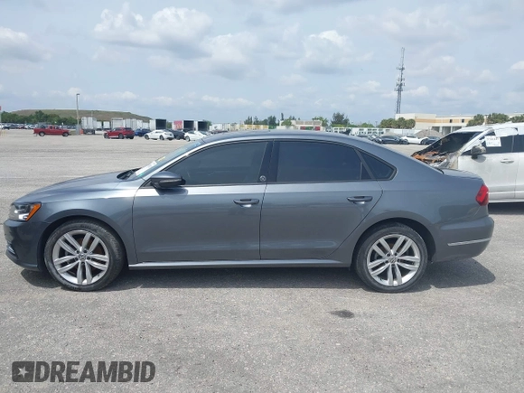 2019 Volkswagen Passat 2.0T Wolfsburg Edition with VIN 1VWLA7A35KC011084, listed as a IAAI auction lot 40385111 with 81,119 mi miles. Bid and sale history available at carsss.com. Image 14.