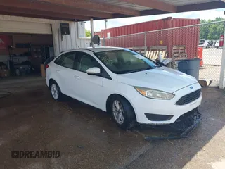 2016 Ford Focus SE z VIN 1FADP3F27GL272129, wystawiony jako IAAI lot #42750048 z przebiegiem 173 472 mil mil oraz . Historia ofert i sprzedaży dostępna na DreamBid. Obrazek 1.