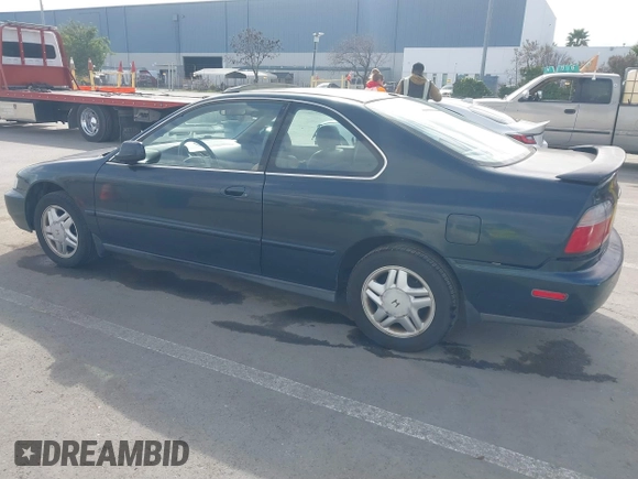 1997 Honda Accord EX with VIN 1HGCD7158VA014025, listed as a IAAI auction lot 41582343 with 302,660 mi miles and . Bid and sale history available at carsss.com. Image 3.