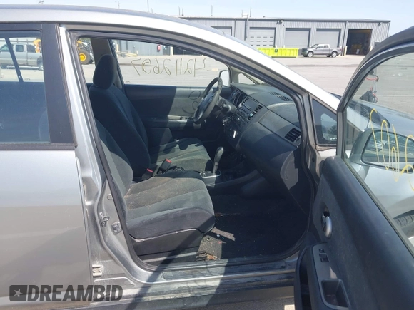 2011 Nissan Versa 1.8 S with VIN 3N1BC1CP0BL434989, listed as a IAAI auction lot 42112607 with 141,996 mi miles. Bid and sale history available at carsss.com. Image 5.