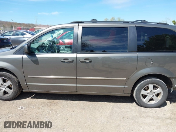 2010 Dodge Grand Caravan SXT with VIN 2D4RN5D1XAR293862, listed as a IAAI auction lot 42179737 with 324,144 mi miles and . Bid and sale history available at DreamBid. Image 14.