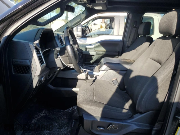 2015 Ford F-150 XLT with VIN 1FTEW1EP9FKE90564, listed as a Copart auction lot 50532105 with 123,494 mi miles and Salvage title. Bid and sale history available at DreamBid. Image 7.